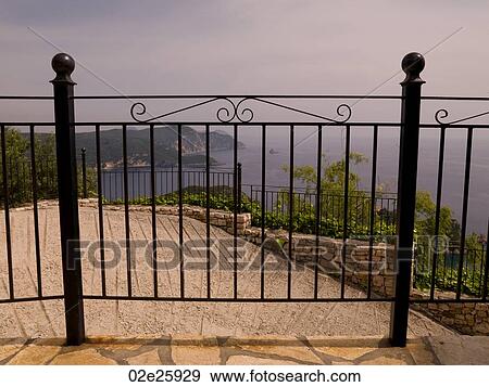 Iron gate in Corfu View Large Photo Image Stock Photo - Iron gate in Corfu. Fotosearch