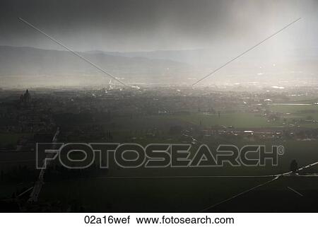 Italy, Assisi aerial view in sunlight View Large Photo Image Stock Image - Italy, Assisi aerial view in sunlight. Fotosearch