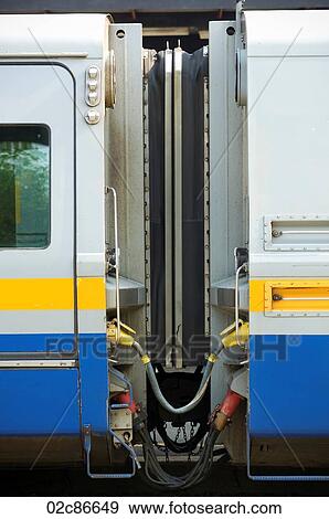 Joining coupling between two train cars. View Large Photo Image Stock Photo - Joining coupling between two train cars.. Fotosearch