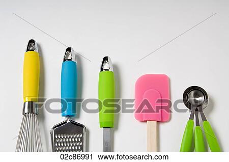 Kitchen utensils with neon accents on a white background. View Large Photo Image Stock Image - Kitchen utensils with neon accents on a white background.. Fotosearch