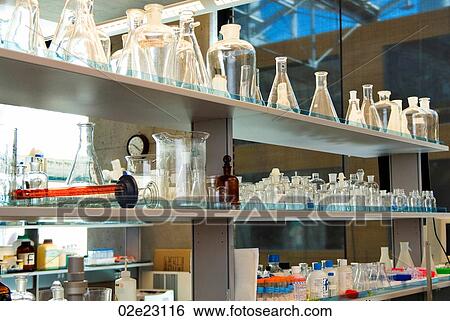 Lab bench with glass beakers and flasks. View Large Photo Image Stock Photograph - Lab bench with glass beakers and flasks.. Fotosearch