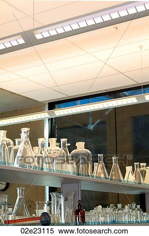 Stock Photography - Lab bench with glass beakers and flasks.. Fotosearch