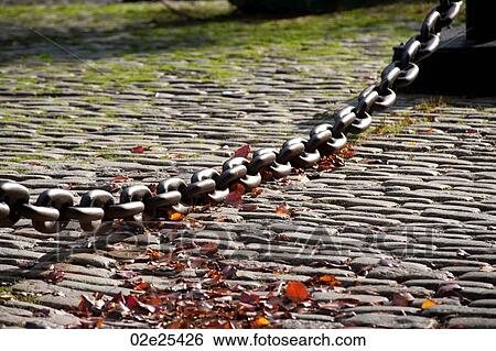 Stock Photograph - Large chain across cobblestone walkway in Boston, Massachusetts, USA. Fotosearch