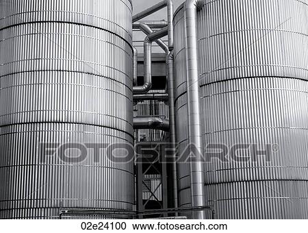 Large industrial metal storage tanks. View Large Photo Image Stock Image - Large industrial metal storage tanks.. Fotosearch