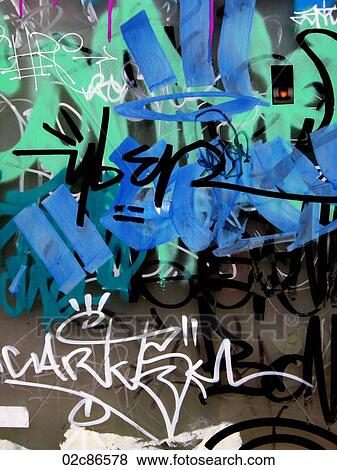 Stock Photo - Layers of graffiti on urban wall.. Fotosearch