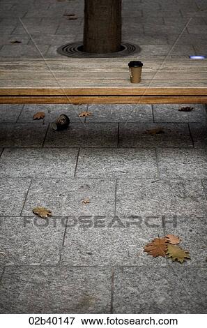 Lone Coffee on bench View Large Photo Image Stock Photo - Lone Coffee on bench. Fotosearch
