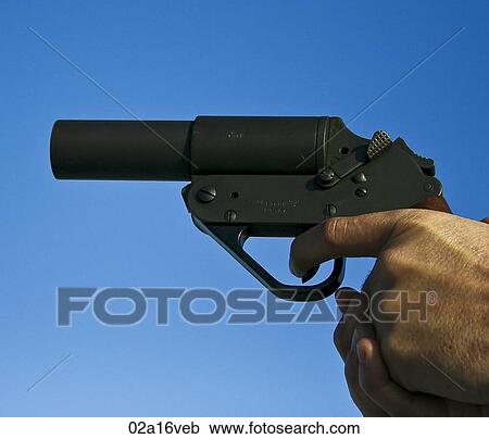 Stock Image - Man pulling trigger of gun. Fotosearch