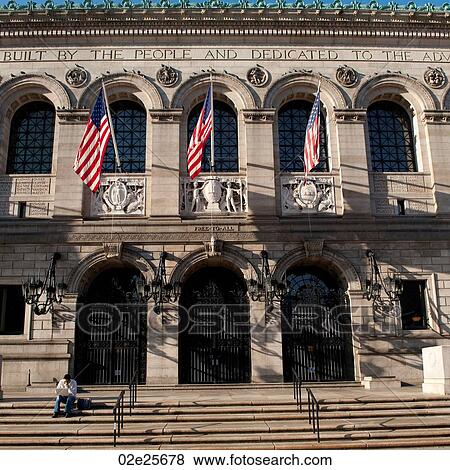 Stock Photo - Man using a laptop in front of a building in Boston, Massachusetts, USA. Fotosearch