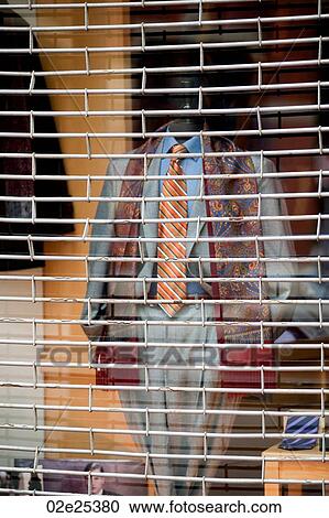Stock Image - Mannequin behind a barrior in Boston, Massachusetts, USA. Fotosearch