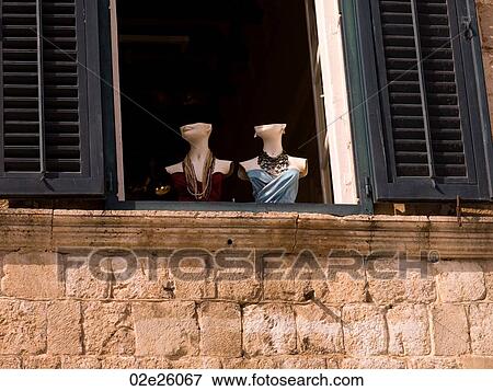 Mannequins in shop window in Dubrovnik View Large Photo Image Stock Photo - Mannequins in shop window in Dubrovnik. Fotosearch