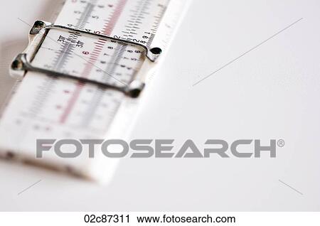 Stock Image - Measuring Slide Ruler on white background.. Fotosearch