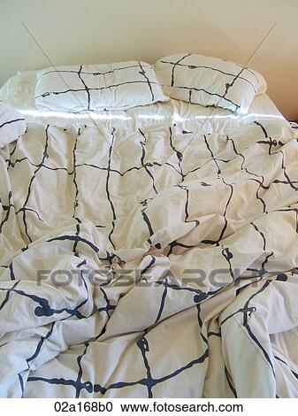 Messy bed with 2 pillows View Large Photo Image Stock Image - Messy bed with 2 pillows. Fotosearch