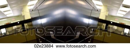 Mirrored composition of filing cabinet in office cubicle. View Large Photo Image Picture - Mirrored composition of filing cabinet in office cubicle.. Fotosearch