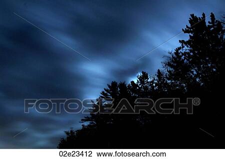 Moonlight and moving clouds. View Large Photo Image Stock Image - Moonlight and moving clouds.. Fotosearch