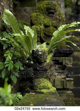 Moss covered statue in Bali View Large Photo Image Stock Photography - Moss covered statue in Bali. Fotosearch