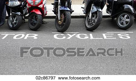 Motorcycles parked on street. View Large Photo Image Stock Photo - Motorcycles parked on street.. Fotosearch