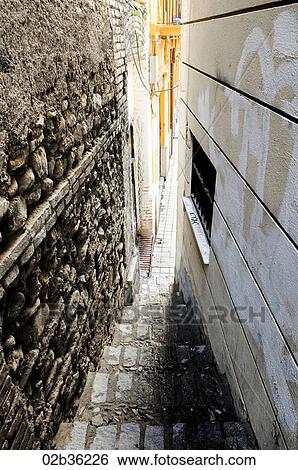 Narrow alley in Granada, Andalusia, Spain - Albaicin View Large Photo Image Stock Photograph - Narrow alley in Granada, Andalusia, Spain - Albaicin. Fotosearch