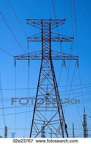Network of power lines on hydro tower against a blue sky. View Large Photo Image Stock Photo - Network of power lines on hydro tower against a blue sky.. Fotosearch