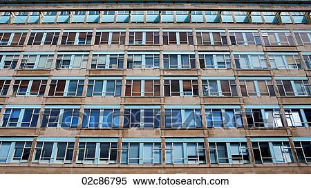 Stock Photography - Network of urban apartment windows.. Fotosearch