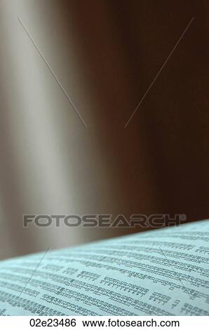 Newspaper stock page with blurred background. View Large Photo Image Stock Photograph - Newspaper stock page with blurred background.. Fotosearch