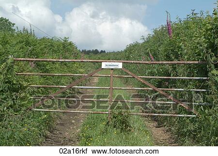 Stock Image - No admittance sign on a farm gate. Fotosearch