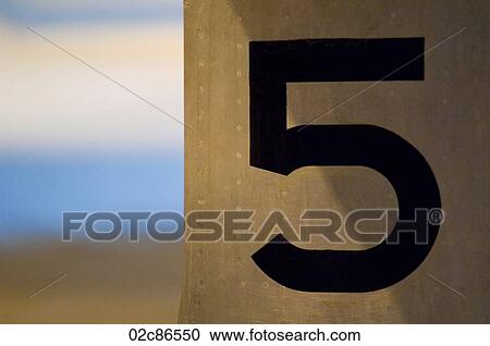 Number 5 painted on metal surface. View Large Photo Image Stock Image - Number 5 painted on metal surface.. Fotosearch