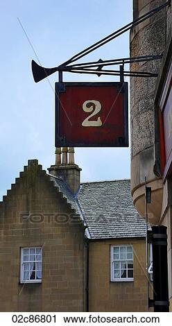 Number two sign above Scottish pub. View Large Photo Image Stock Image - Number two sign above Scottish pub.. Fotosearch