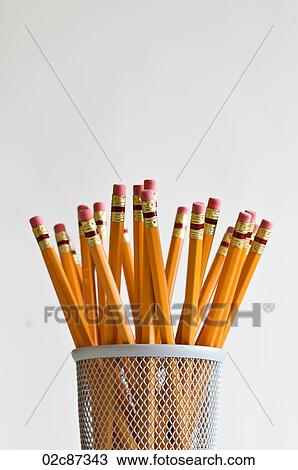 Numerous orange HB lead pencils in holder, on white background. View Large Photo Image Stock Image - Numerous orange HB lead pencils in holder, on white background.. Fotosearch
