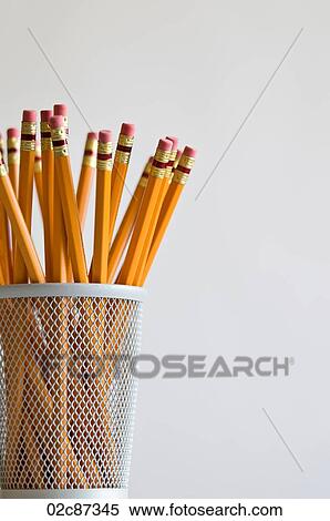 Numerous orange HB lead pencils in holder, on white background. View Large Photo Image Stock Photography - Numerous orange HB lead pencils in holder, on white background.. Fotosearch