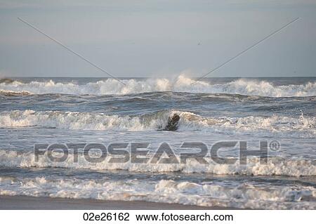 Ocean waves along Hamptons shoreline View Large Photo Image Stock Image - Ocean waves along Hamptons shoreline. Fotosearch