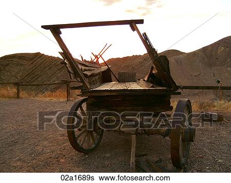 Old wagon in the wild west View Large Photo Image Stock Photograph - Old wagon in the wild west. Fotosearch
