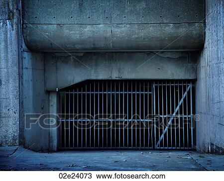 Ominous closed urban cement grating. View Large Photo Image Stock Image - Ominous closed urban cement grating.. Fotosearch