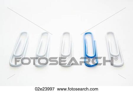 One blue paper clip included in group of white ones. View Large Photo Image Stock Photo - One blue paper clip included in group of white ones.. Fotosearch
