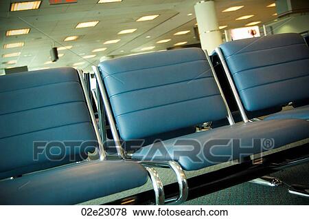 Stock Photo - Open seating in airport departures lounge.. Fotosearch