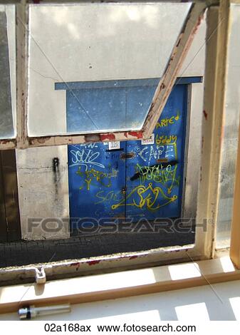 Open window with a view of a blue door on the street View Large Photo Image Stock Photo - Open window with a view of a blue door on the street. Fotosearch