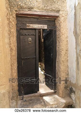 Open wooden door in Lamu Town, Africa View Large Photo Image Stock Photo - Open wooden door in Lamu Town, Africa. Fotosearch