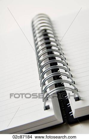Opened blank coiled note pads. View Large Photo Image Picture - Opened blank coiled note pads.. Fotosearch