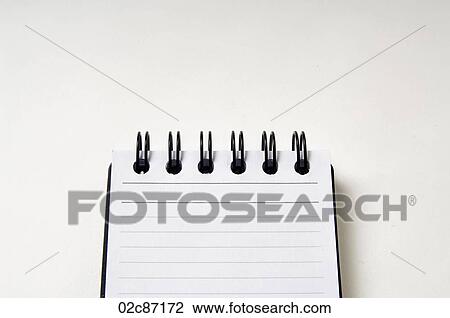 Stock Image - Opened blank coiled note pads.. Fotosearch