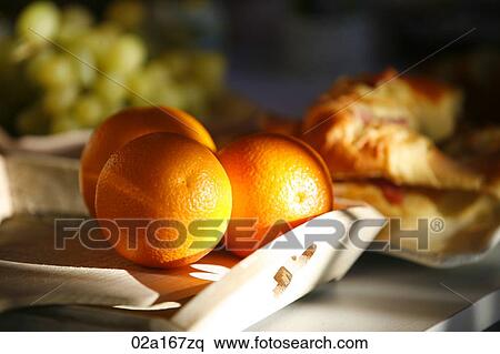 Oranges on a table View Large Photo Image Stock Photography - Oranges on a table. Fotosearch
