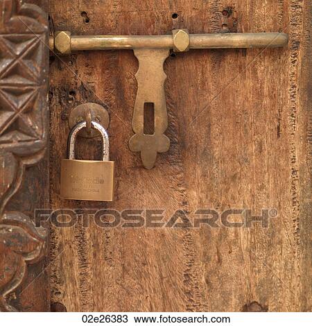Padlock on door in Lamu Town, Kenya Africa View Large Photo Image Stock Image - Padlock on door in Lamu Town, Kenya Africa. Fotosearch