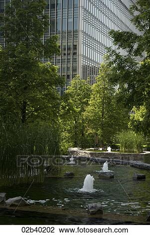 Stock Image - Park stream in Canary Wharf. Fotosearch