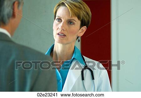 Patient consulting with female doctor. View Large Photo Image Stock Image - Patient consulting with female doctor.. Fotosearch