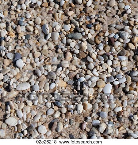 Stock Photo - Pebbles on a beach. . Fotosearch