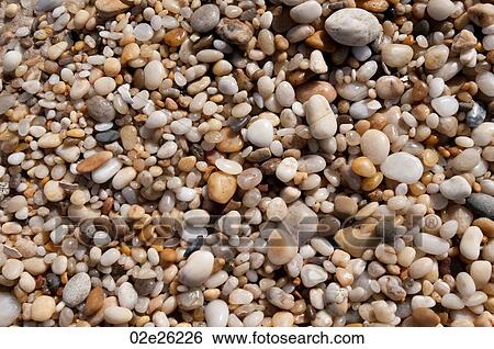 Pebbles on the Hampton shoreline View Large Photo Image Stock Photograph - Pebbles on the Hampton shoreline. Fotosearch