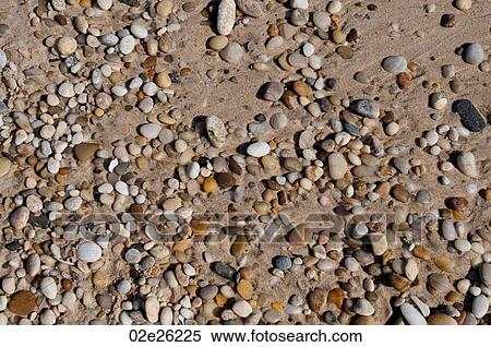 Pebbles on the Hampton shoreline View Large Photo Image Stock Photography - Pebbles on the Hampton shoreline. Fotosearch