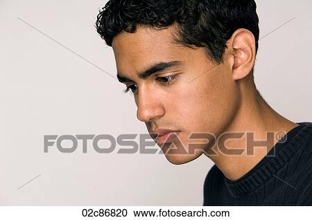 Pensive young tean male. View Large Photo Image Stock Image - Pensive young tean male.. Fotosearch