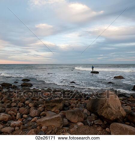 People fishing off the Hampton shoreline View Large Photo Image Stock Image - People fishing off the Hampton shoreline. Fotosearch