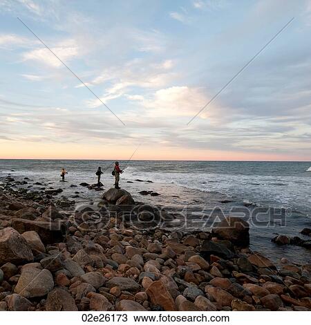 People fishing off the Hampton shoreline View Large Photo Image Stock Image - People fishing off the Hampton shoreline. Fotosearch