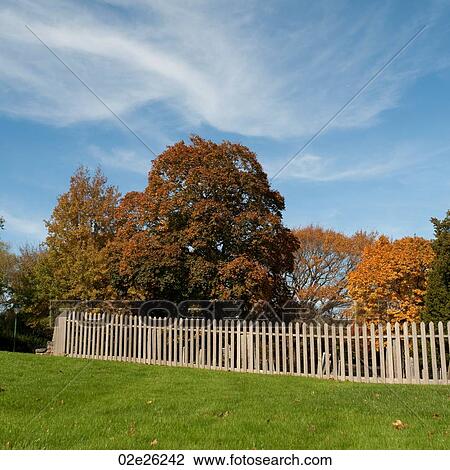Stock Image - Picket fence in East Hamptons. Fotosearch