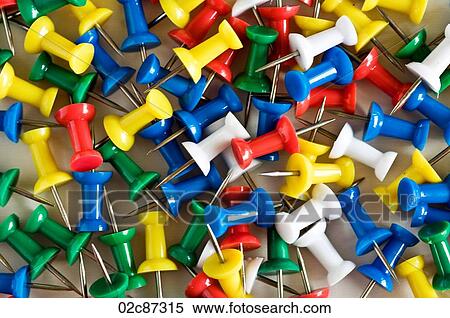 Stock Photography - Pile of multi-colored push pins.. Fotosearch